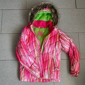 Ski jacket by Spyder. Removable faux fur trim on the hood. Size 14